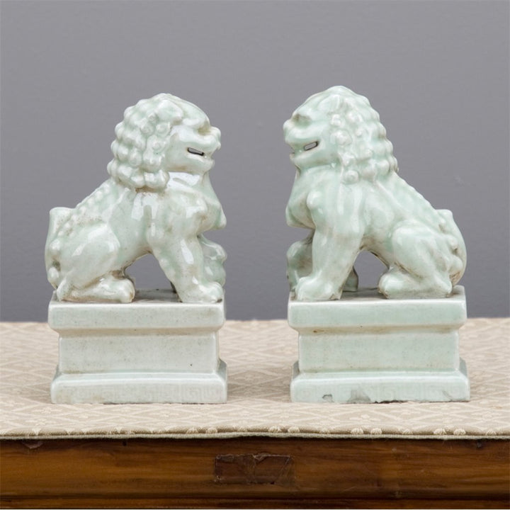 Pair of Celadon Foo Dogs