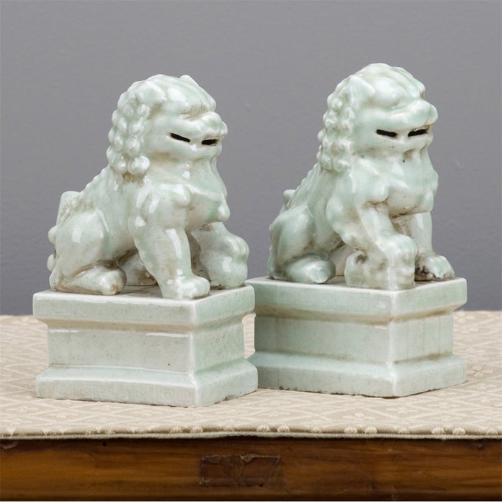 Pair of Celadon Foo Dogs