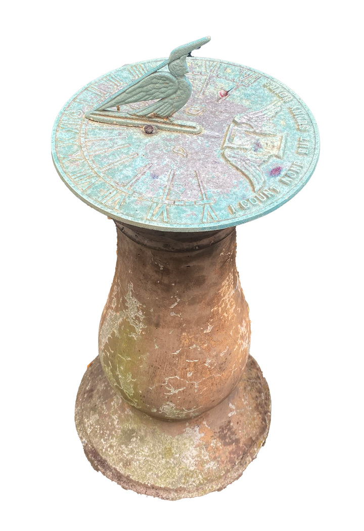 Vintage Verdigris Sundial on Aged Concrete Pedestal